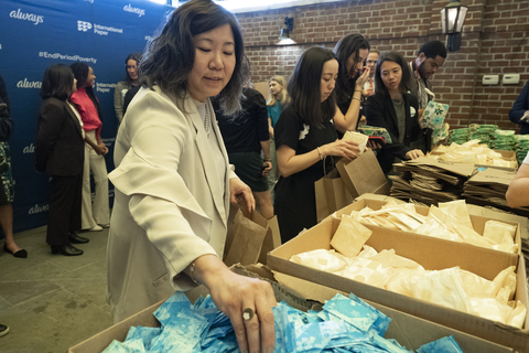 Congresswoman Grace Meng and other event attendees help pack 600 period product kits to be donated to the local community to help #EndPeriodPoverty (Photo: Ian Wagreich)