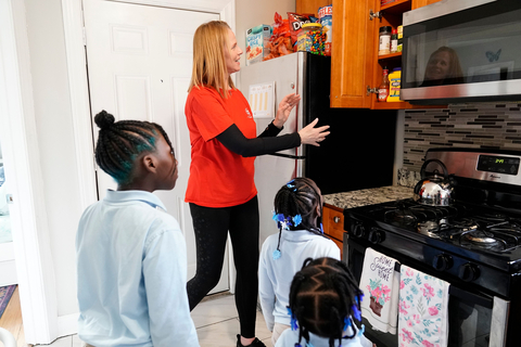 thumbnail Nourishing Neighbors: Volunteers from Jewel-Osco filled a family's pantry for a year. Photo Courtesy: Albertsons Companies