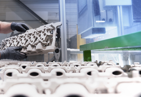 Sand core assessment after binder jet 3D printing on ExOne additive manufacturing equipment at BMW’s Landshut plant. Courtesy and Copyright, BMW Group.