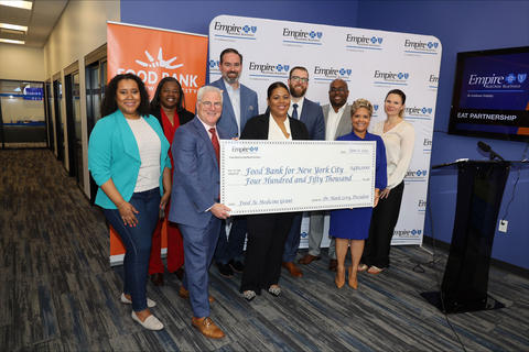 Empire presented a check for $450,000 to Food Bank For New York City during a community food distribution event. (Photo: Business Wire)