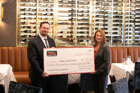 As part of the pre-opening celebration for the newest location in Mt. Pleasant, Ruth’s Chris hosted a special dinner with community leaders, business owners and Ruth’s Chris executives to raise money for the Greater Lansing Food Bank. Pictured are Ruth’s Chris Steak House Mt. Pleasant Regional General Manager Michael Atkins and Greater Lansing Food Bank CEO Michelle Lantz. (Photo: Business Wire)