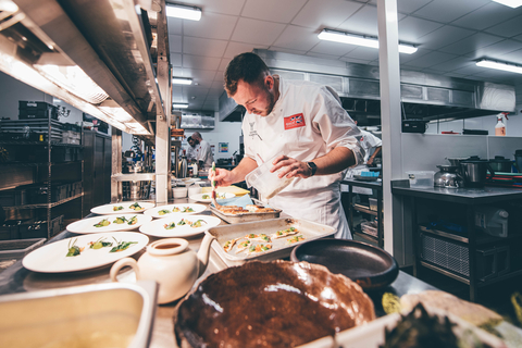 2022 World YCYW Wales Chef Winner Ali Halbert, from Heaney’s in Cardiff perfects his main course during the 2022 world final in Monaco. (Photo credit: Young Chef Young Waiter)