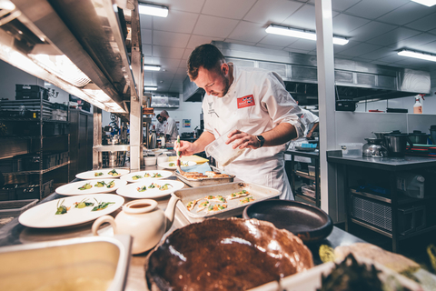 original 2022 World YCYW Wales Chef Winner Ali Halbert, from Heaney’s in Cardiff perfects his main course during the 2022 world final in Monaco. (Photo credit: Young Chef Young Waiter)