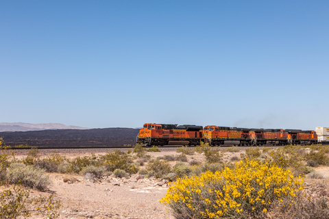 BNSF Intermodal train rolls through the desert outside of Barstow, California. (Photo: Business Wire)