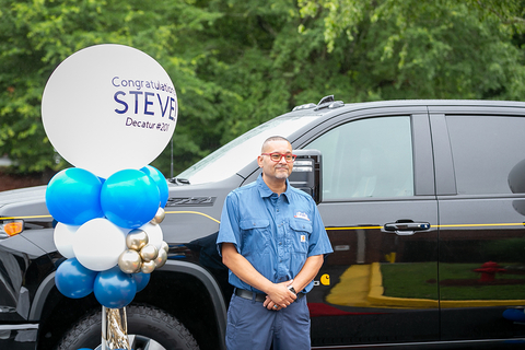 original Cintas Service Sales Representative (SSR) Steve Rosa stands next to his brand-new truck that he won in April through a Cintas-Carhartt customer awareness campaign. The vehicle was delivered to Rosa's Decatur, Ga., Cintas location on Thursday morning. (Photo: Business Wire)