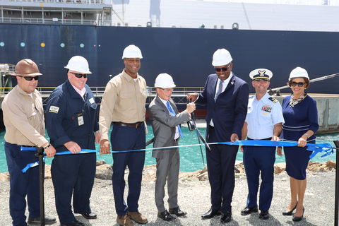 Ocean Point Terminals CEO Todd Dillabough and USVI Governor Albert A. Bryan, Jr. prepare to cut the ribbon commencing FSU LNG operations at one of the company's marine docks. From left to right: Jeffrey Jones, OPT LNG Project Manager, Capt. John Peacock, OPT Marine Manager, Jeffrey Charles, OPT COO, Todd Dillabough, OPT CEO, Gov. Albert A. Bryan, Jr., USVI Governor, Lt. Jean-Pierre Freeman, USCG Rio St. Croix, Sen. Diane Capehart (D), USVI (Photo: Business Wire)