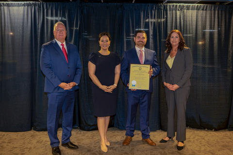original Cintas Corporation was again recognized for its health and safety practices as the company’s distribution center located in Ashland, Ky., has earned its third Governor’s Safety and Health Award. Pictured from left to right: Jamie Link, Secretary of the Kentucky Education and Labor Cabinet; Jacqueline Coleman, Kentucky Lt. Governor; Andrew Glass, Cintas Safety Coordinator; Rachel May, Cintas Production Coordinator. (Photo: Cintas Corporation)