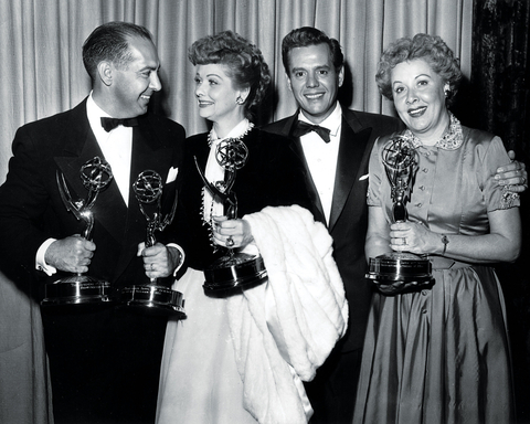 Emmy Loves Lucy: "I Love Lucy's" producer Jess Oppenheimer (left) celebrates the classic comedy's win as Best Situation Comedy with star Lucille Ball, executive producer Desi Arnaz (center) and Vivian Vance at the sixth Emmy Awards on Feb. 11, 1954, at the Hollywood Palladium. (Photo courtesy of the Television Academy)