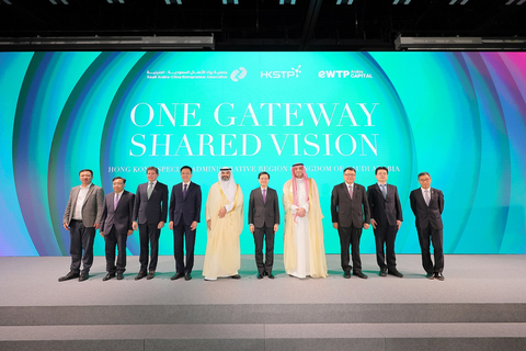 A group photo of officiating guests on stage. (From left) Jerry Li, Director General of SCEA and the Founder Managing Partner of eWTPA; Ivan Lee, Commissioner for Innovation & Technology of HKSAR; Nicolas Aguzin, CEO of Hong Kong Exchanges and Clearing; Professor Dong Sun, Secretary for Innovation, Technology and Industry of HKSAR; H.E. Eng. Abdullah Al-Swaha, Minister of Communications & Information Technology, The Kingdom of Saudi Arabia; John Lee, Chief Executive of HKSAR; Dr Sunny Chai, Chairman of HKSTP, Professor Zhanjun Ma, Director of Trading Affairs Group and Albert Wong, CEO of HKSTP. (Photo: Business Wire)