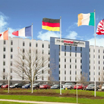 Photo_of_building_with_flags.jpg