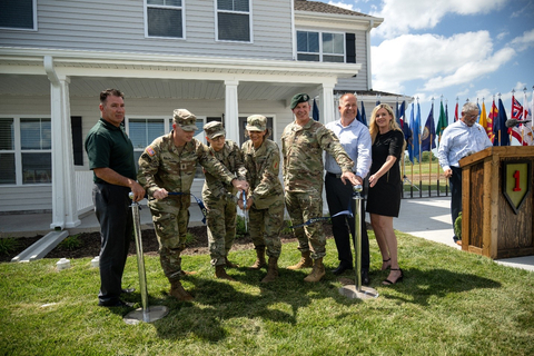 The ribbon cutting celebrated the completion of 52 new homes. Pictured left to right: Steve Milton, Fort Riley Army Housing Office Chief; Cmd. Sgt. Major Christopher L. Mullinax; Sgt. First Class Janet Godwin; Chief Warrant Officer Two Tatiana Santacruz; Garrison Commander Col. Michael Foote; Pete Sims, Managing Director DOD at Corvias; Kolby Stobbe, RVP Property Operations at Corvias. (Photo: Business Wire)