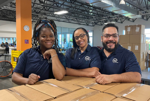 EFG Companies employees (left to right) Verlecia Washington, Talya Bell and Cody Castillo represent the organization's culture of giving back during a recent community volunteer session supporting the North Texas Food Bank. EFG Companies employees ranked it as one of the most innovative, engaged employers among business service companies in north Texas, citing high employee engagement, strong company vision, and commitment to delivering value for clients. (Photo: Business Wire)
