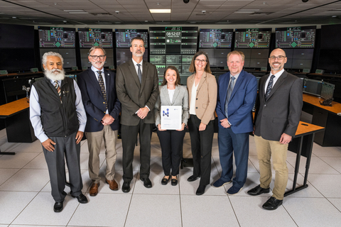 original Left to right: Getachew Tesfaye, U.S. Nuclear Regulatory Commission; Senior Project Manager; Robert Gamble, NuScale Power Vice President of Engineering; Brian Smith, U.S. Nuclear Regulatory Commission Director of the Division of New and Renewed Licenses; Carrie Fosaaen, NuScale Power Vice President of Regulatory Affairs; Karin Feldman, NuScale Power Vice President of Program Management Office; Robert Taylor, U.S. Nuclear Regulatory Commission Deputy Office Director for New Reactors; and Mark Shaver, NuScale Power Director of Regulatory Affairs marked the U.S. Nuclear Regulatory Commission’s acceptance of NuScale’s Standard Design Approval Application for formal review. (Photo: Business Wire)