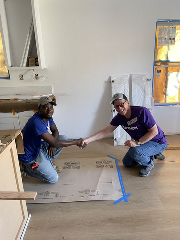 loanDepot President and CEO Frank Martell (r) volunteered for Habitat for Humanity with company executives and employees, helping build homes in Santa Ana, Calif. (Photo: Business Wire)