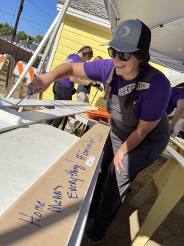 loanDepot Senior Corporate Counsel Meredith Grant volunteered for Habitat for Humanity with company executives and employees in Santa Ana, Calif., demonstrating why "Home Means Everything." (Photo: Business Wire)