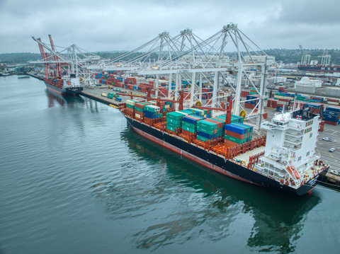 Swire Shipping has appointed SSA Terminals as its container terminal operator at the Ports of Seattle, Long Beach and Oakland. Two vessels in view at the Port of Seattle this summer. (Photo: Business Wire)