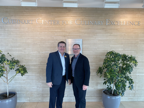 The latest partnership between Hestan and Johnson & Wales University showcases their continued collaborative effort to invest in the futures of students pursuing culinary arts. Pictured are Basil Larkin, SVP of Sales, and Steve Shipley, Resource Development at Johnson & Wales University. (Photo: Business Wire)