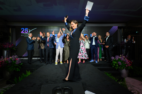 Event co-chair Amy Marks Dornbusch and the V Foundation Wine Celebration board of directors cheer the record $21 Million raised. (Photo: Business Wire)