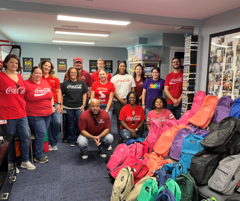 original Team members in Tampa gathered at the Tampa Police Department's R.I.C.H. House to fill backpacks and help organize supplies and food to aid the local community. (Photo: Business Wire)