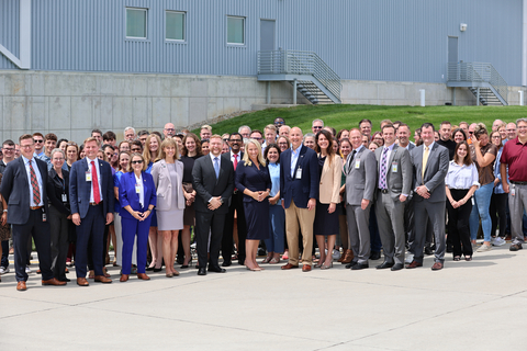 Zoetis CEO Kristin Peck (center), along with Zoetis colleagues and local officials, gather to celebrate the official opening of the company's new monoclonal antibodies (mAbs) expansion in Lincoln, Neb. Source: Zoetis
