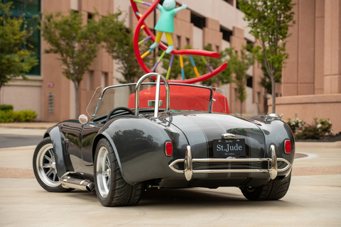 original During the Aug. 9, 2023 St. Jude JAM charity concert and auction, a replica 1965 Shelby Cobra Roadster built by FedEx pilots sold at auction for $125K, surpassing an incredible $1 million raised for St. Jude since the first annual build in 2015. (Photo: Business Wire)
