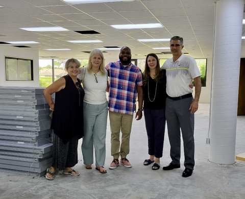 The Revere Payments team in their new office space before construction begins (Photo: Business Wire)