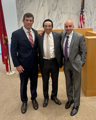 Smokey Robinson, with his attorneys, David Schecter (left) and Sasha Frid (Photo: Business Wire)