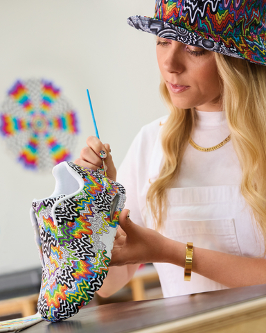 The new Skechers x Jen Stark collection launches the brand’s Visual Artist Series, featuring Stark’s vibrant drip patterns on several women’s styles. (Photo: Business Wire)