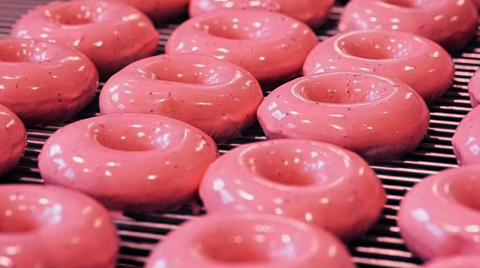 Krispy Kreme will give summer a sweet sendoff by treating fans to one “perfect last bite of summer” with the return of its popular Strawberry Glazed Doughnuts over Labor Day Weekend – Friday, Sept. 1 through Monday, Sept. 4 at participating shops nationwide. (Photo: Business Wire)