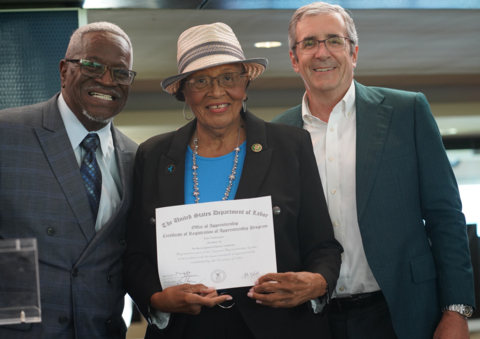 Garfield Garner, Office of Apprenticeships Regional Director for the Southeast, U.S. Department of Labor; Rep. Alma Adams (D-NC) and Dave Regnery, chair and CEO, Trane Technologies; celebrate the Trane Technologies Technician Apprenticeship Program’s (TAP) national registration from the Department of Labor. (Photo: Business Wire)