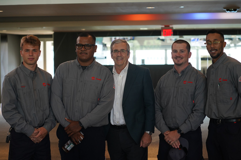 Members of the Trane Technologies Technician Apprenticeship Program (TAP) join Trane Technologies chair and CEO Dave Regnery at the signing ceremony celebrating the program’s national registration from the Department of Labor. From L to R: David Burger, Alex Castaneda, Dave Regnery, Cody Nelson, Earnell Newman. (Photo: Business Wire)
