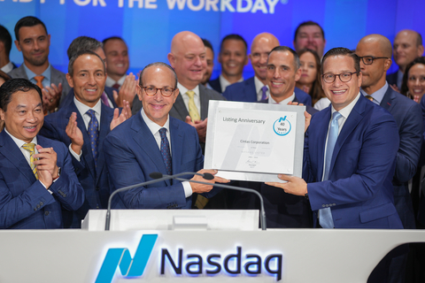 Cintas President & CEO Todd Schneider with Nasdaq Chief Client Officer Joseph Brantuk celebrating Cintas' 40th anniversary of going public and being listed on the Nasdaq exchange. (Photo Credit: Nasdaq, Inc./ Vanja Savic)