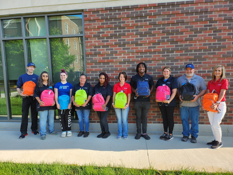 Corvias Property Management team members shop for and fill backpacks for students at Attica Elementary School in Attica, IN (Photo: Business Wire)