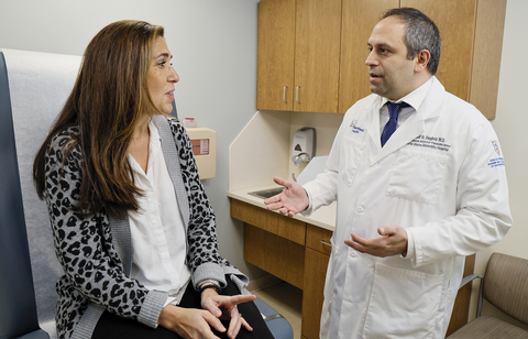 Dr. Nabil Dagher, vice president and director of the Northwell Transplant Institute, meets with a patient. Credit Northwell Health. (Photo: Business Wire)