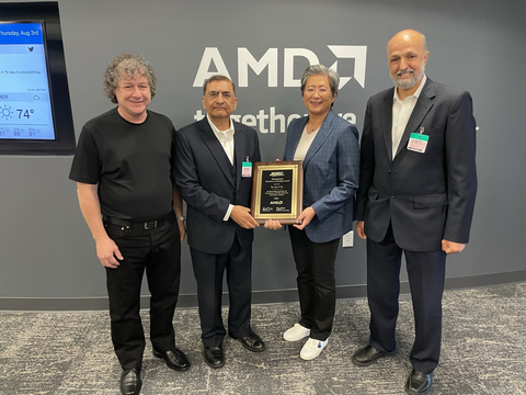 JEDEC Board members Joe Macri (left), Chairman Mian Quddus, and Belal Gharaibeh present Dr. Lisa T. Su, AMD Chair and CEO, with the association's Distinguished Executive Leadership Award for 2023. (Photo: Business Wire)