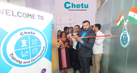 Brian Poole, director of marketing for Chetu, cuts the ribbon to celebrate the opening of a state-of-the-art Skill Development Centre in Noida, India. (Photo: Business Wire)
