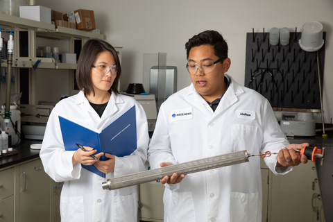 R&D Scientists, Joshua Moreno and Dr. Yen Ling, in the REGENESIS lab hold a FluxTracer unit. (Photo: Business Wire)