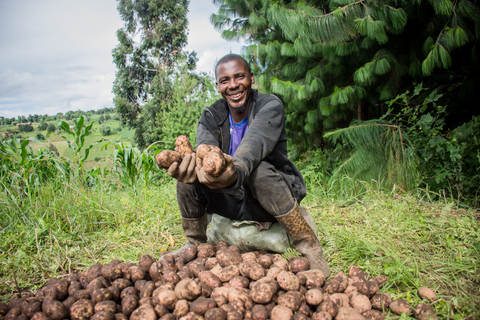 Onesmo Mdetele is a 38-year-old smallholder farmer from Njombe Township district in Tanzania. Onesmo typically plants two acres of potatoes, and first enrolled with One Acre Fund in 2018. "Paying for my input slowly was what motivated me to enroll with One Acre Fund," Onesmo says. "With this flexible payment it's easier to fulfill other family duties with the money, especially paying for my children's school fees." Photo: One Acre Fund