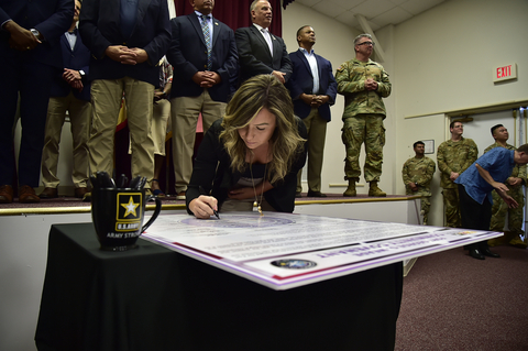 Brittney Dabney, Corvias Operations Director at Fort Meade participates in the 2023 Community Covenant Signing and Great American Defense Community Recognition event. (Photo: Business Wire)