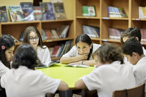 Students are starting high school reading well below their grade level, leading them to struggle in multiple subjects. (Photo: Business Wire)