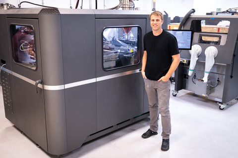 FreeFORM Technologies President Nate Higgins, shown in front of a Desktop Metal X25Pro, now operates the world’s largest fleet of 25 Desktop Metal binder jet 3D printers, which transform metal powder into complex end-use parts. The Pennsylvania-based FreeFORM is also slated to take delivery of a Production System P-50, the world's fastest metal binder jet system with Single Pass Jetting (SPJ) technology. (Photo: Business Wire)