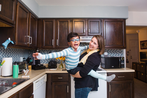 Salim, pictured with his mom, lives with EB. They battle this rare genetic skin disorder and have hope that one day, thanks to passionate researchers and advocates, EB will be history. (Photo: EB Research Partnership)
