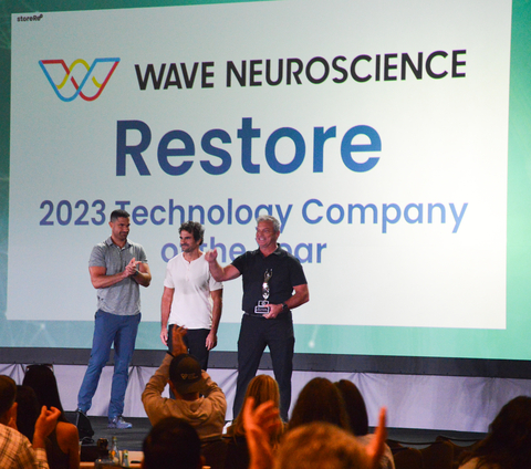 Restore Hyper Wellness Chief Medical Officer, Dr. Rich Joseph, and CTO/CPO, Jeremy Landis, present the Restore 2023 Technology Award to Brain Neuro. (Photo: Business Wire)