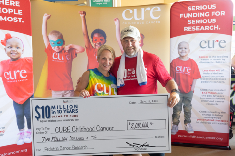 Kristin Connor, CEO of CURE Childhood Cancer, and Bobby Aiken, CEO of Lendmark Financial Services, at 'The Climb,' an annual awareness and wellness event during the Climb to Cure campaign. (Photo: Business Wire)
