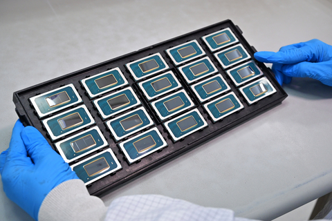 A photo shows a tray of Intel Core Ultra processors being assembled at Intel’s advanced packaging facilities in Penang, Malaysia. The Intel Core Ultra processor, code-named Meteor Lake, is the first client processor manufactured on the new Intel 4 process node using its 3D high-performance hybrid architecture, and the first client tile-based design enabled by Foveros packaging technology and features CPU, GPU and NPU. (Credit: Intel Corporation)