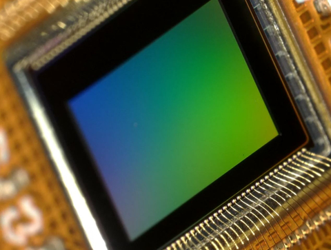 Sheba Microsystems Wire-Bonded Sensor on MEMS. Proprietary technology compensates for thermal expansion by moving the lightweight sensor, instead of moving the lenses. (Photo: Business Wire)