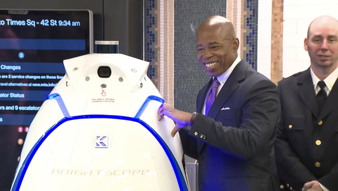 New York City Mayor Eric Adams poses with NYPD's newest crime fighter - the Knightscope K5. (Photo: Business Wire)