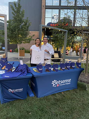 original Puppies and Golf President Amanda Renner and Petsense by Tractor Supply GM & Senior Vice President Matthew Rubin attend Barkin’ Bash event in Nashville Sept. 21, 2023. (Photo: Business Wire)