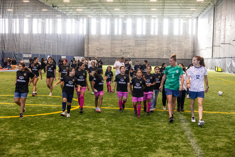 Kids attending a soccer clinic hosted at Intentional Sports along with U.S. Women's National team players Alyssa Naeher​ (left) and Tierna Davidson​ (right.) (Photo: Business Wire)