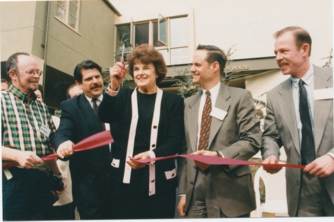 United States Senator Dianne Feinstein cuts the ribbon on February 10, 1996, at the opening of Linn House, one of three AIDS hospices built and operated by AIDS Healthcare Foundation (AHF). To her immediate photo left is Zev Yaroslavsky, then Los Angeles County Supervisor (District 3), and on her photo right is Michael Weinstein, AHF cofounder and president. (Photo: Business Wire)